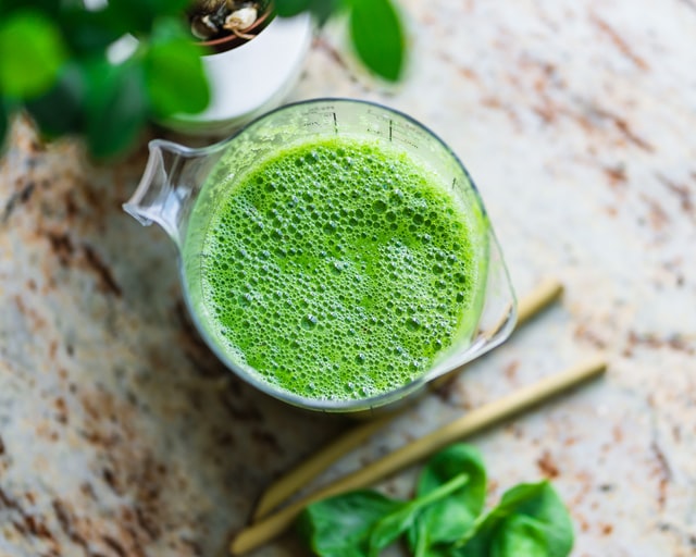 A glass of green smoothie