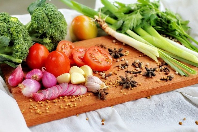 Bunch of anti inflammatory  vegetables and spices on a table