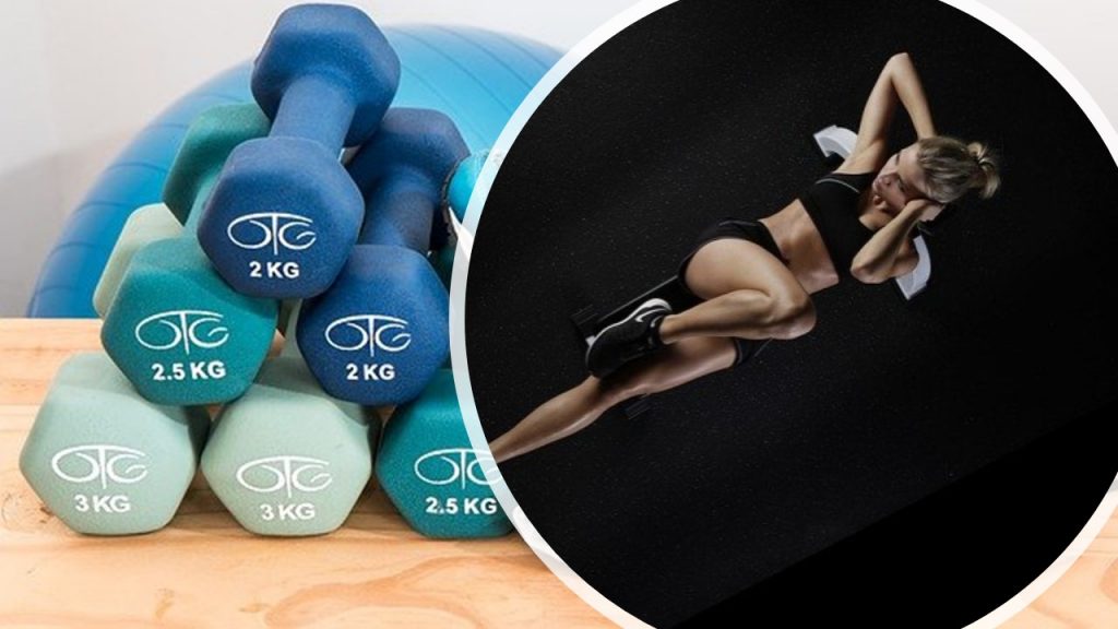 Woman doing Abs workout and dumbbells